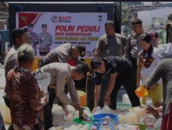 Polres Pelabuhan Makassar Peduli Kemanusian Salurkan Air Bersih Kemasyarakat
